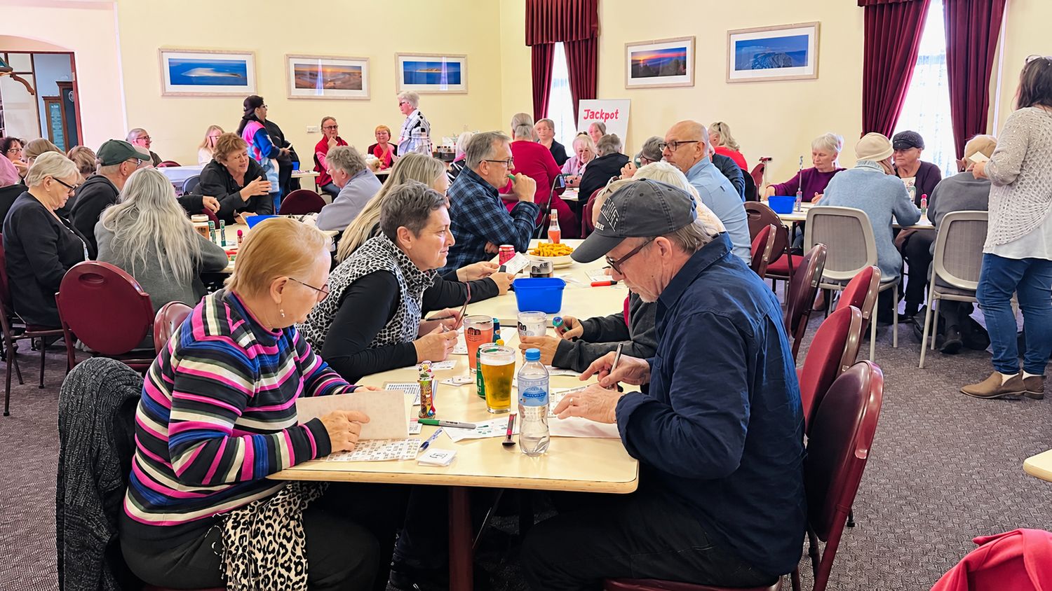 The Federation Room at the Castle Hotel filled with people playing bingo